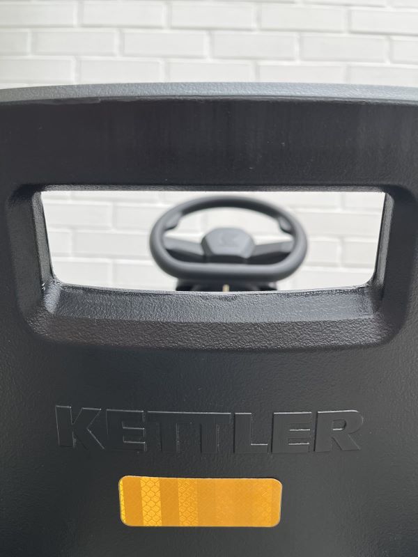 KETTLER Reflektoren-Set, 4-teilig in orange - angeklebt an der Rückenlehne des Kettler Kettcar